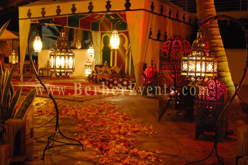 Moroccan Themed Events: Rose petals, Moroccan Lamps and Moroccan Lanterns leading to the Moroccan Tent